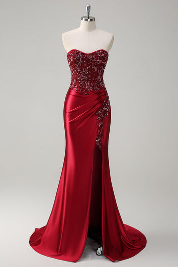 Zapaka Women Sparkly Mermaid Burgundy Corset Long Formal Dress with Slit Sequins Satin Strapless Evening Dress with Beading